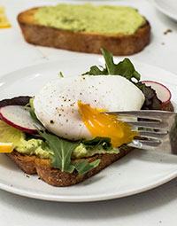 Avocado Ricotta Toast With Poached Eggs
