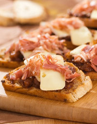 Crostini with Fig and Brie and Prosciutto
