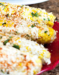 Grilled Corn with Parmesan Spread & Basil