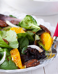 Mixed Green Salad With Oranges, Spiced Pecans And Pomegranate Vinaigrette